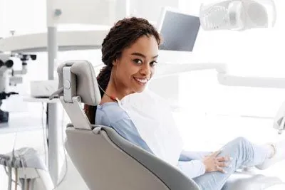 woman smiling during her visit to Family Practice Dentistry