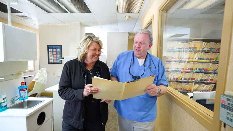 Dr. Kevin Welch and a female staff member at Family Dental Practice in Kokomo IN.