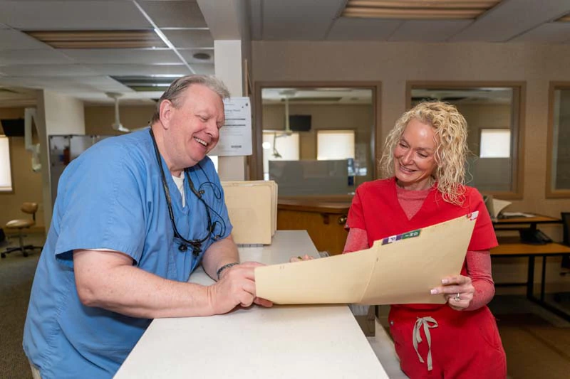 Dr. Kevin Welch and a female staff member at Family Dental Practice in Kokomo IN.