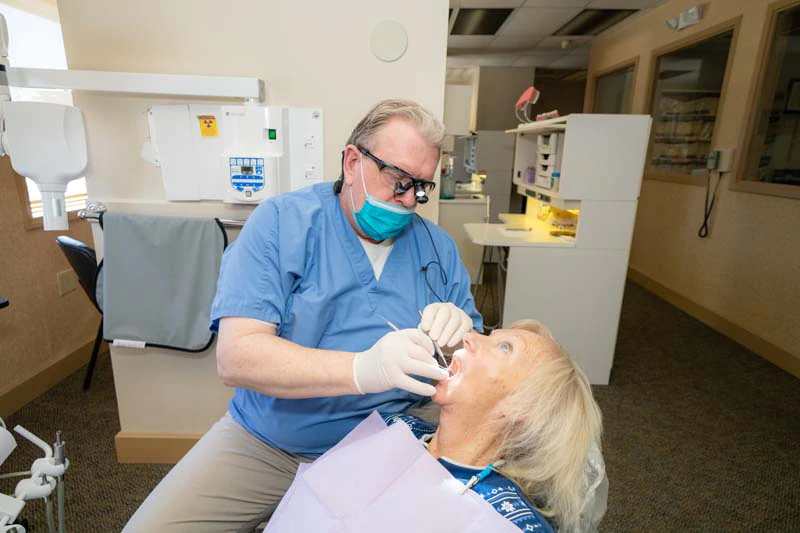 Dr. Kevin Welch with a patient undergoing preventative dental procedures at Family Dental Practice in Kokomo IN.